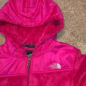 The North Face pink zip-up